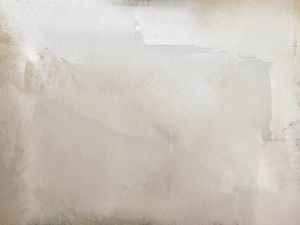 Subtle textured wall with neutral tones perfect as a background or for design use.